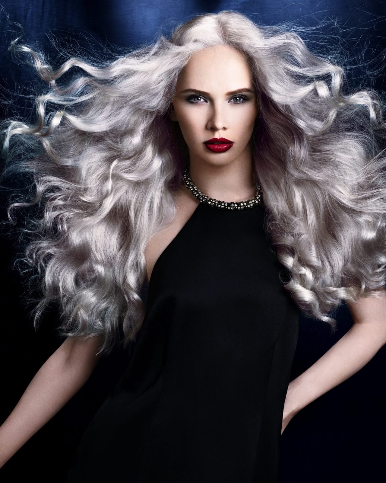 Silver-blonde hair styled in voluminous waves, from a Michael John shoot